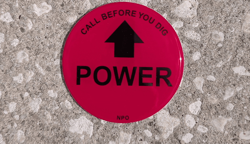 Red warning sticker: "Call Before You Dig".