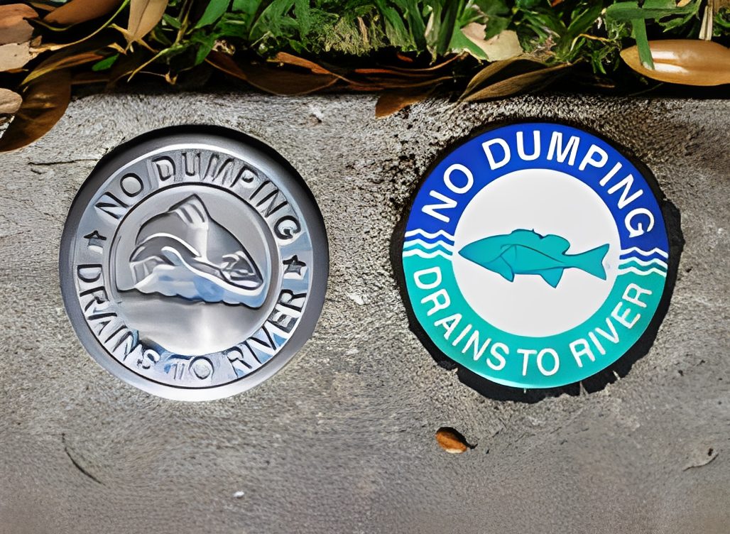 Environmental warning signs on concrete